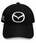 Gorra DERRAPA Mazda Spirit Racing Negro con logo blanco, vista frontal, sobre fondo blanco